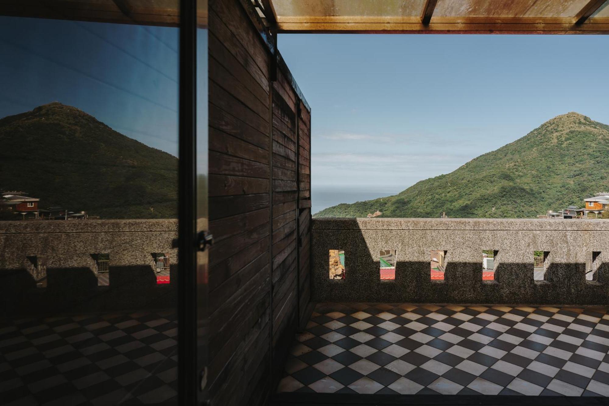 Mountain Traveler Inn Цзюфэнь Экстерьер фото